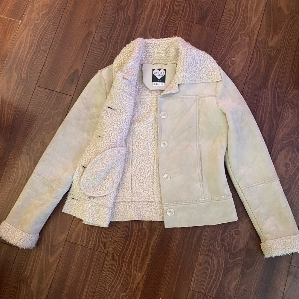 Beige jacket with fur on the inside